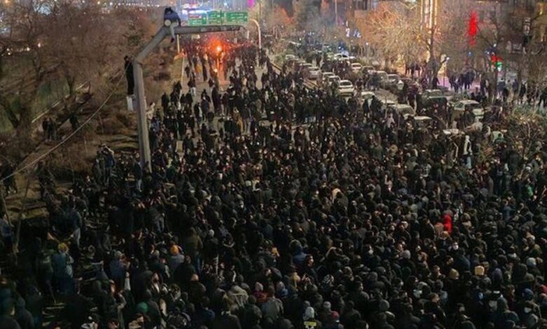 Large crowds of protesters march through the streets of Mashhad, northeastern Iran on January 8, 2026